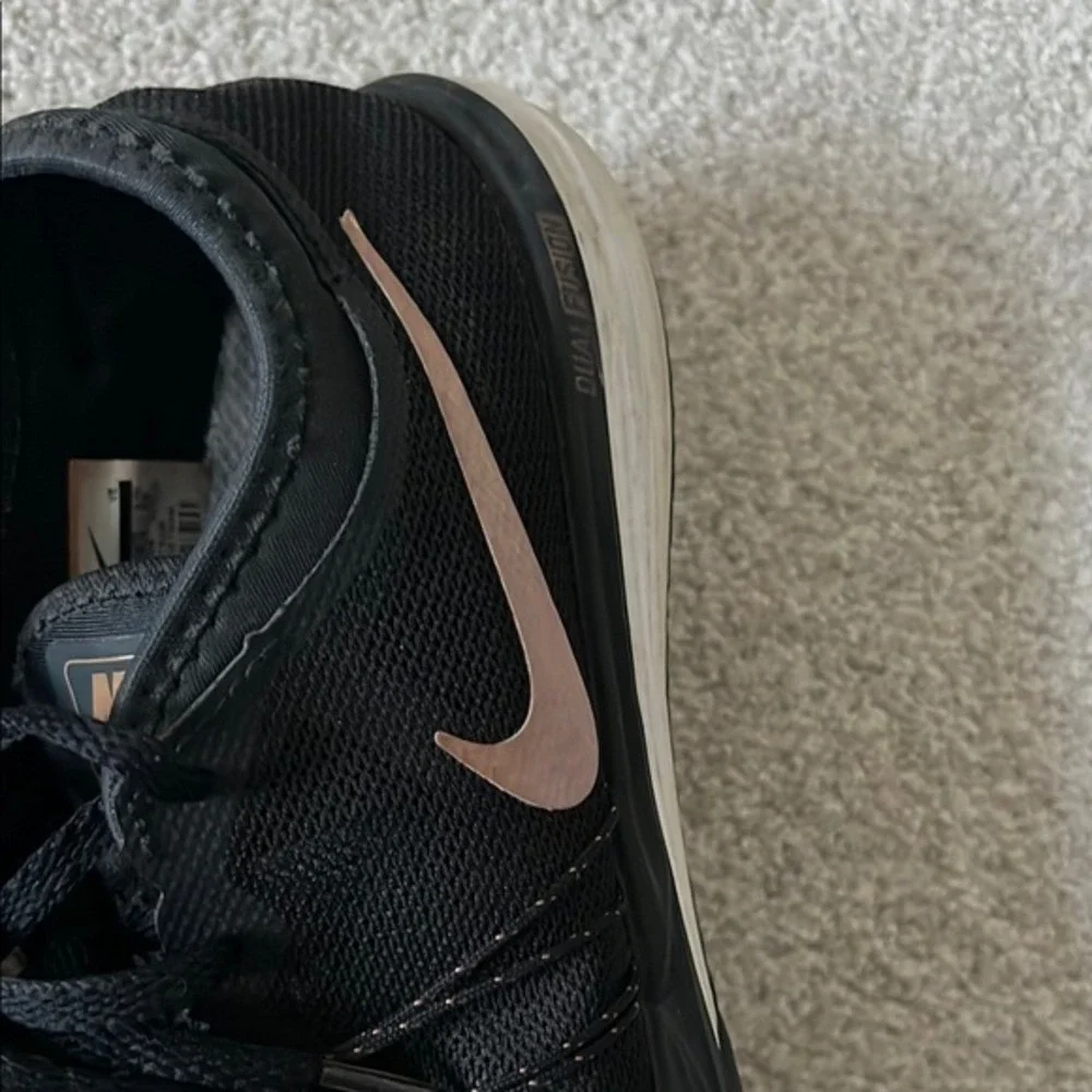 Nike Black and Rose Gold Athletic Shoes‎ with Sleek Design
